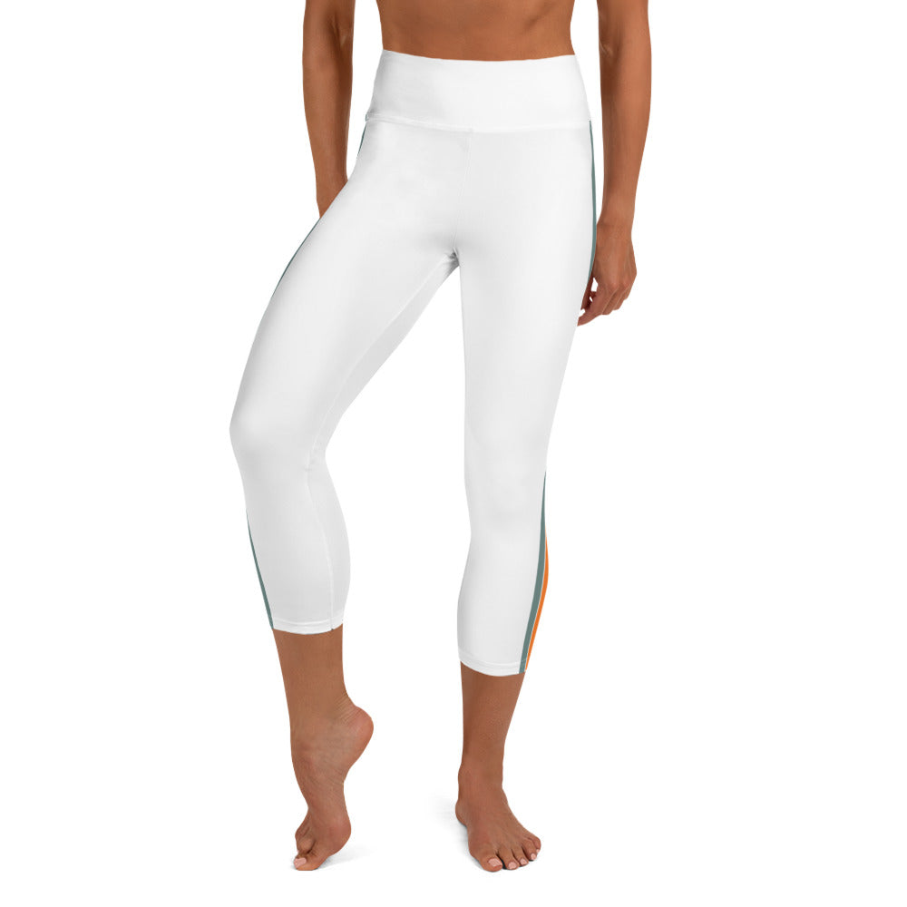 https://areafislandclothing.com/cdn/shop/products/all-over-print-yoga-capri-leggings-white-front-63add55daf319_1200x.jpg?v=1697858101